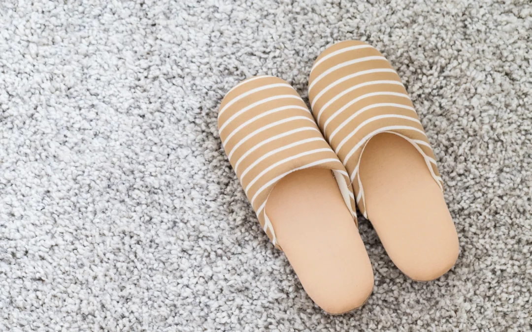 soft-brown-color-slippers-on-carpet